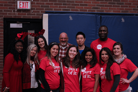 Corporate volunteers from PwC at the Downtown West holiday party. Their t-shirts read: “I’m part of it: empowering communities.”