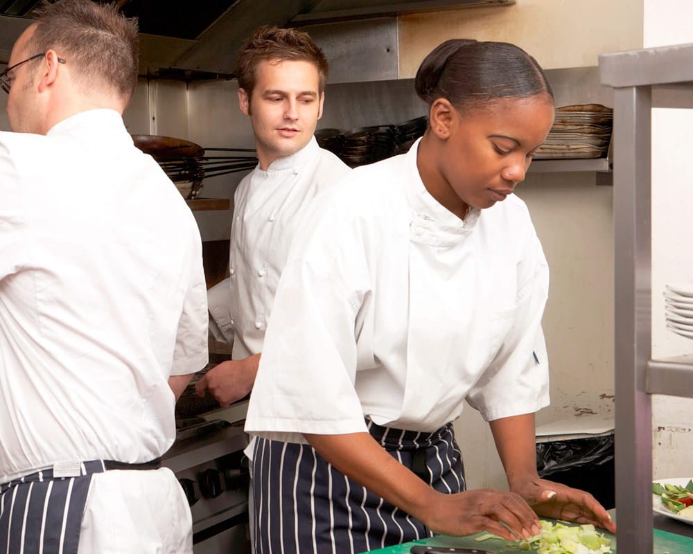 Kitchen staff in restaurant.