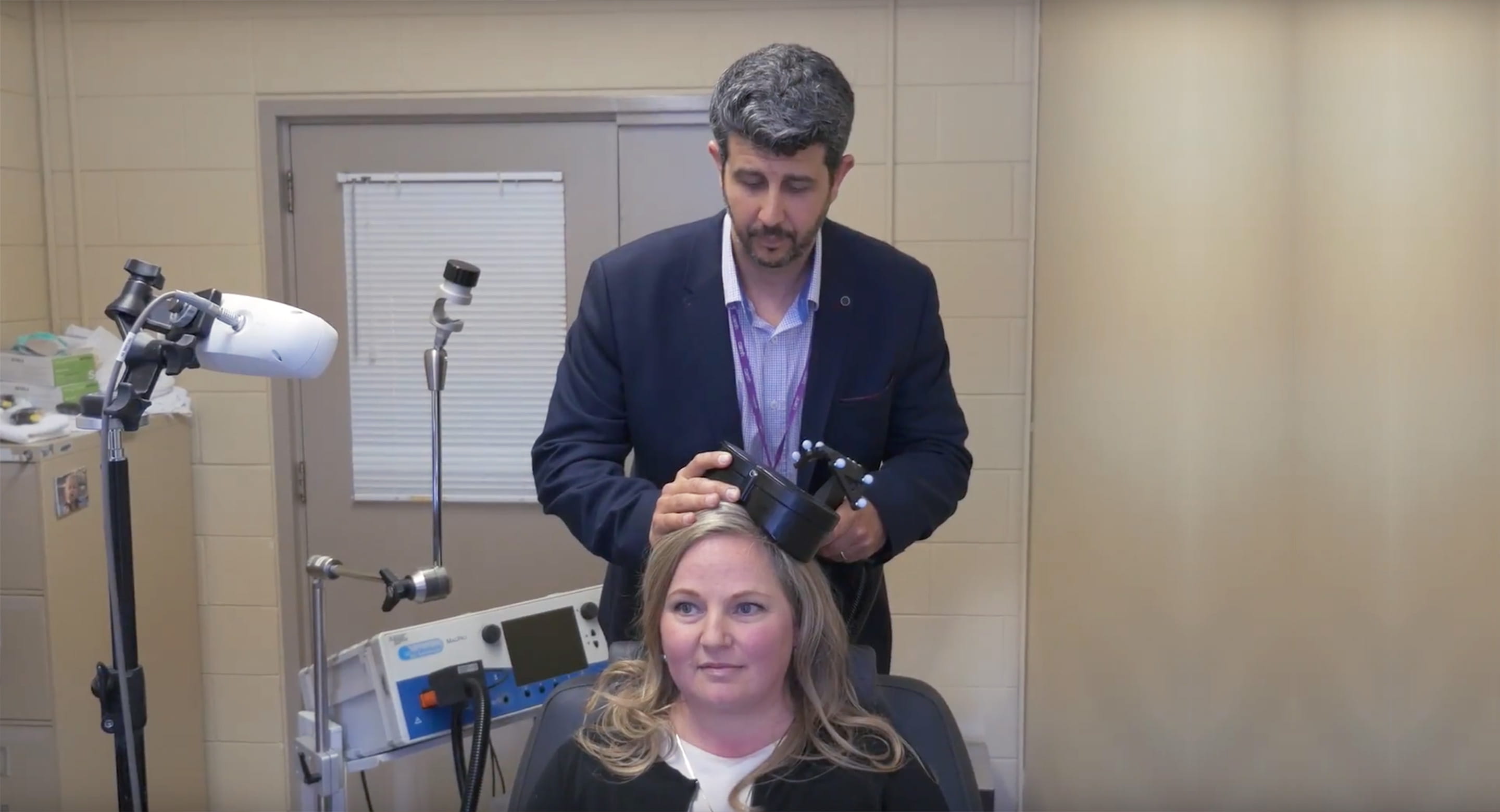 Dr. Daniel Blumberger demonstrates intermittent theta burst stimulation