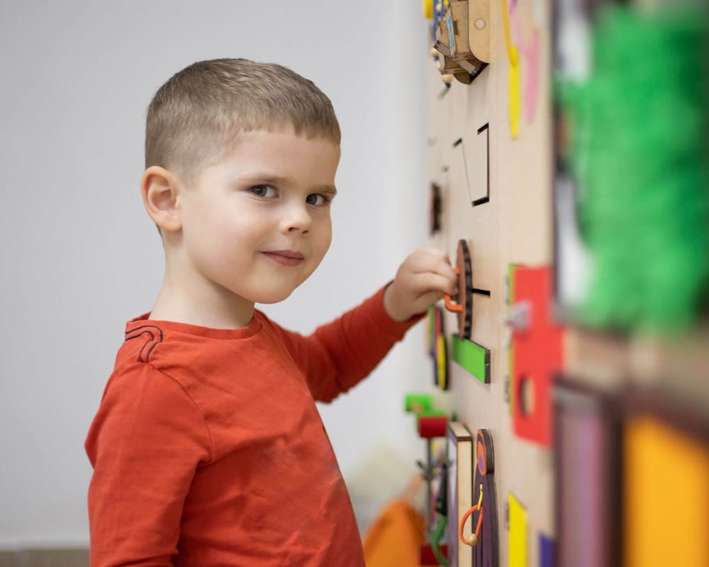 Stock image: boy playing on wall