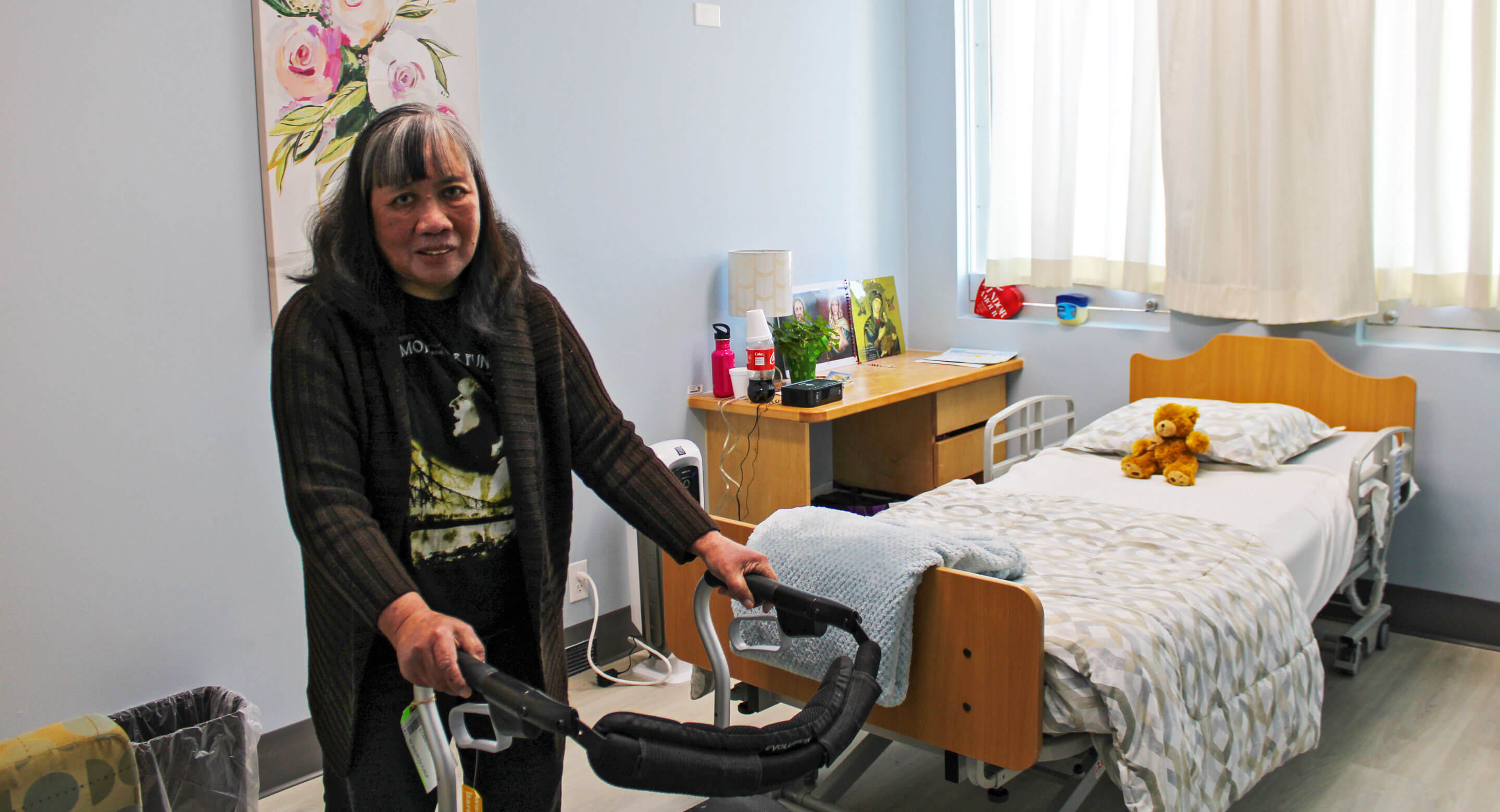 LOFT client Maria in her new room at The Path Home at the College Street site.