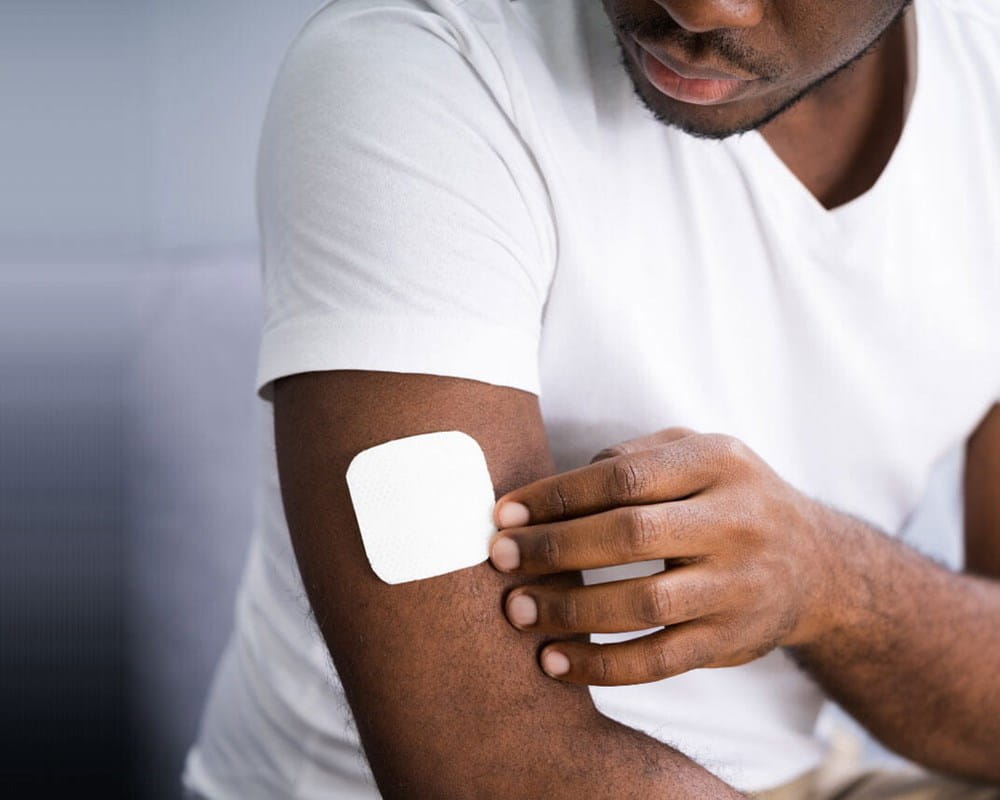 Man with a nicotine patch