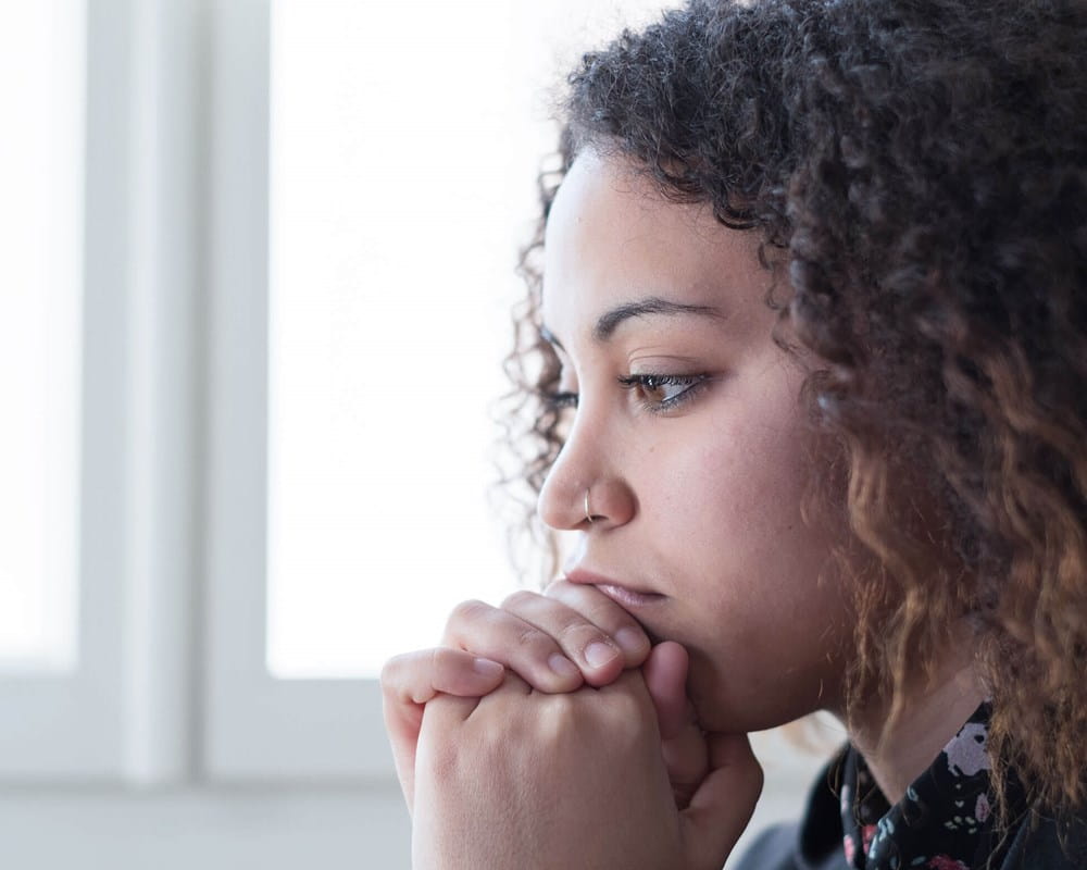 Young woman looking sad