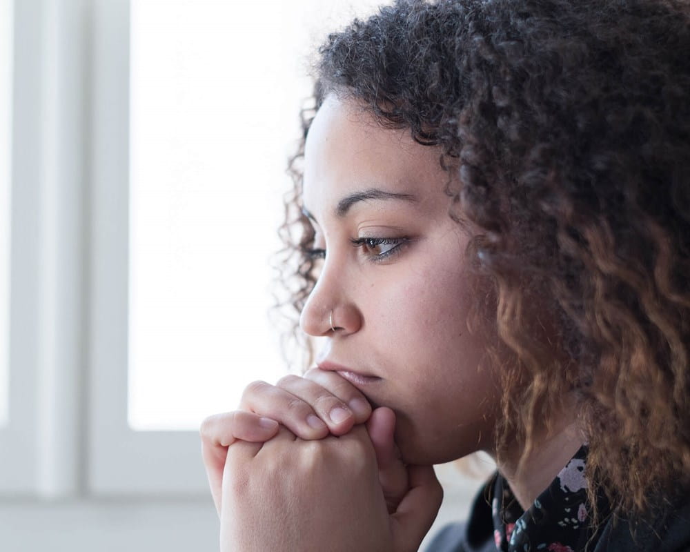 Young woman looking sad