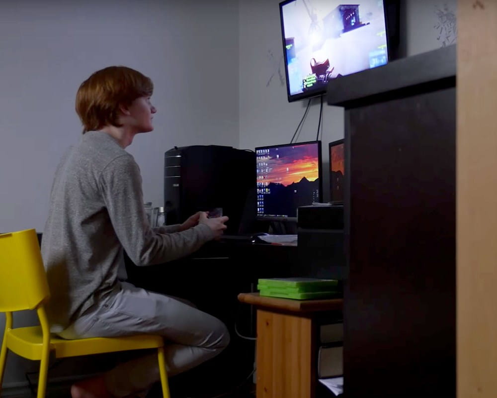 Teenage boy playing video games