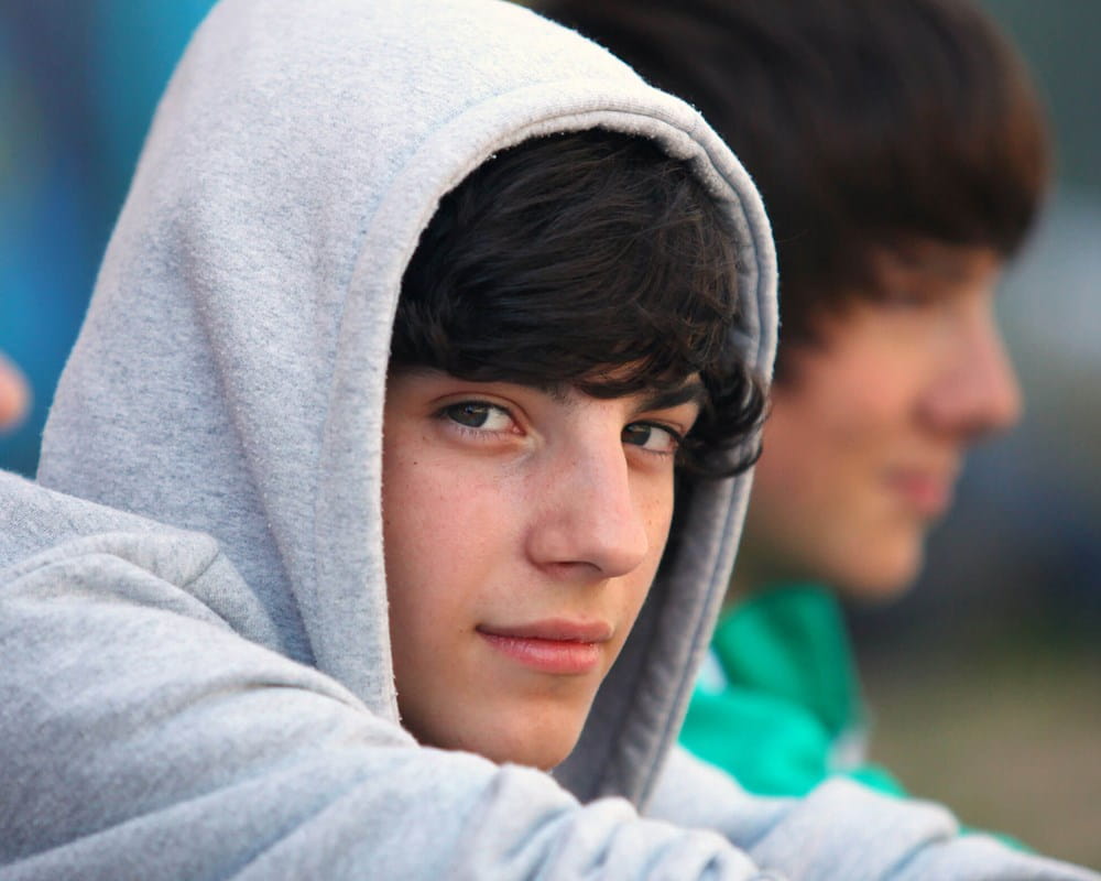 Teenager looking at camera