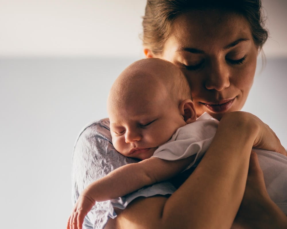 Mother holding baby