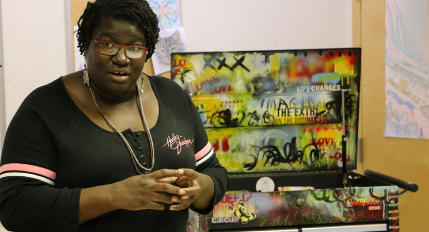 Woman with the painted art cart at CAMH