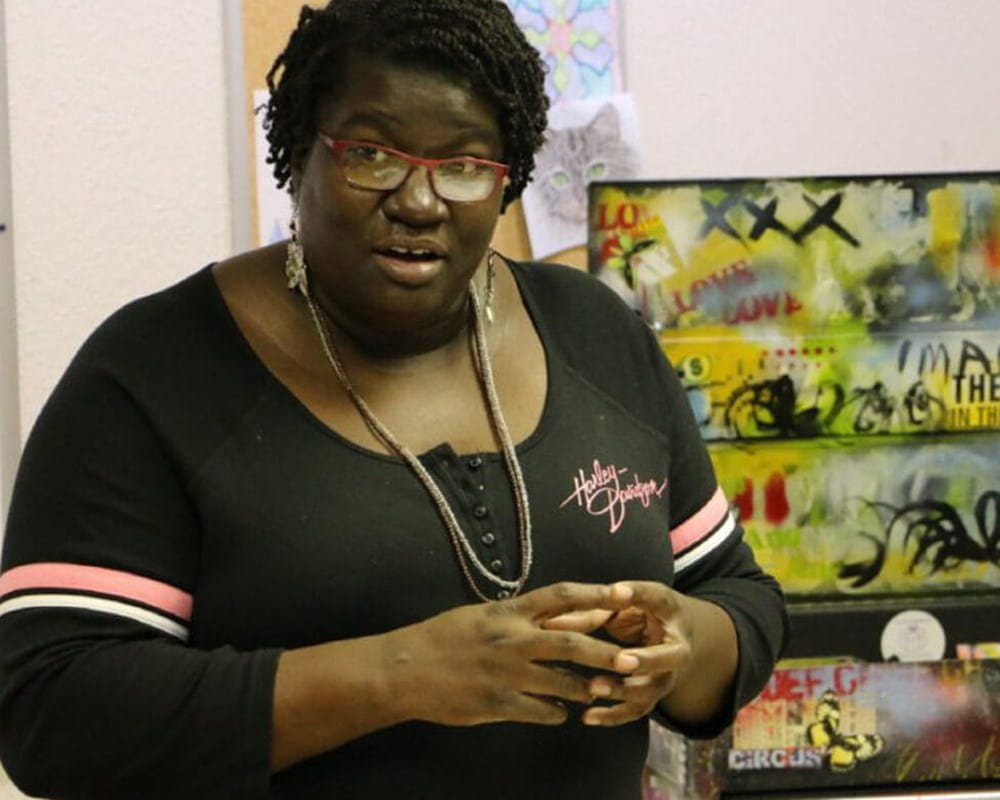 Woman with the painted art cart at CAMH
