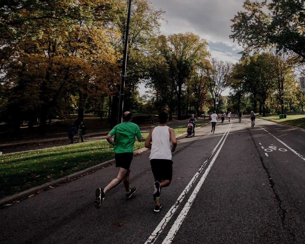 People running in a park