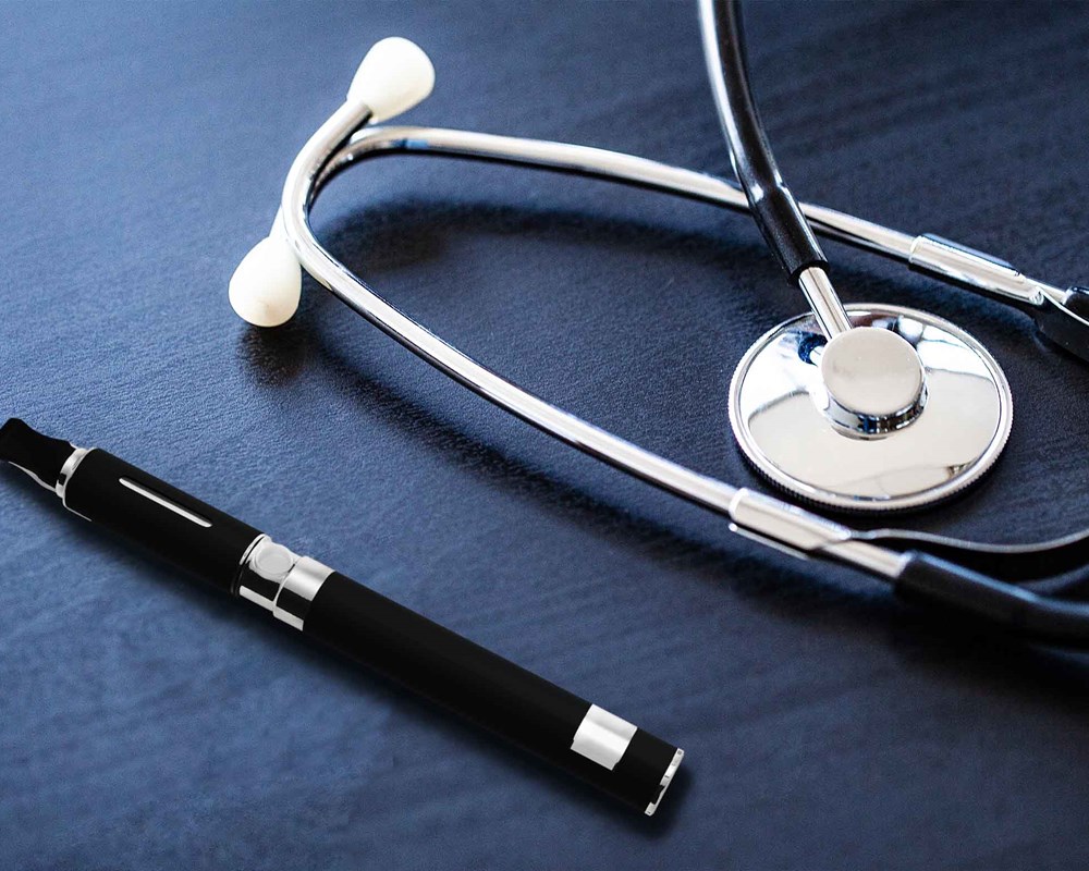 Image of an e-cigarette and stethoscope